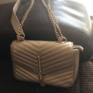 Gold fashion nova purse still new only worn once!